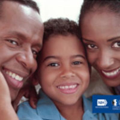 African American father, son, and mother smiling; the son has one hand on each parent’s cheek. NIH, National Eye Institute. NEHEP, National Eye Health Education Program, a program of the National Institutes of Health.