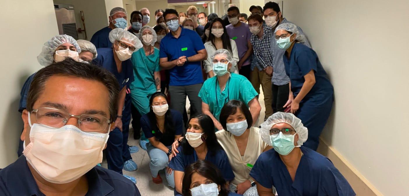 Dr Bharti with group in hallway
