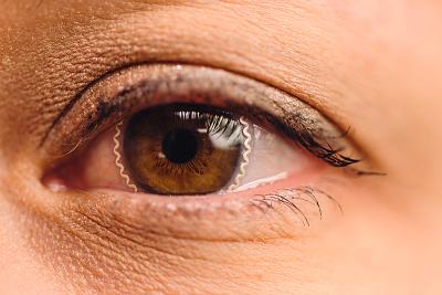 Contact lens with special edges on a person's eye.